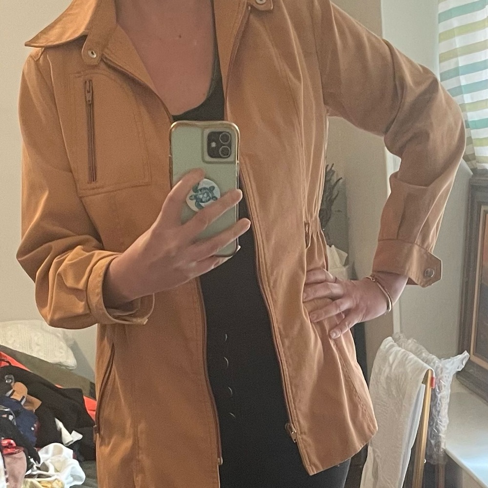 Peach toned raincoat/windbreaker